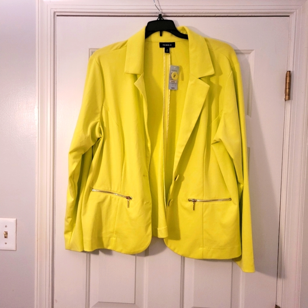 Jacket from Torrid with pocket zippers.